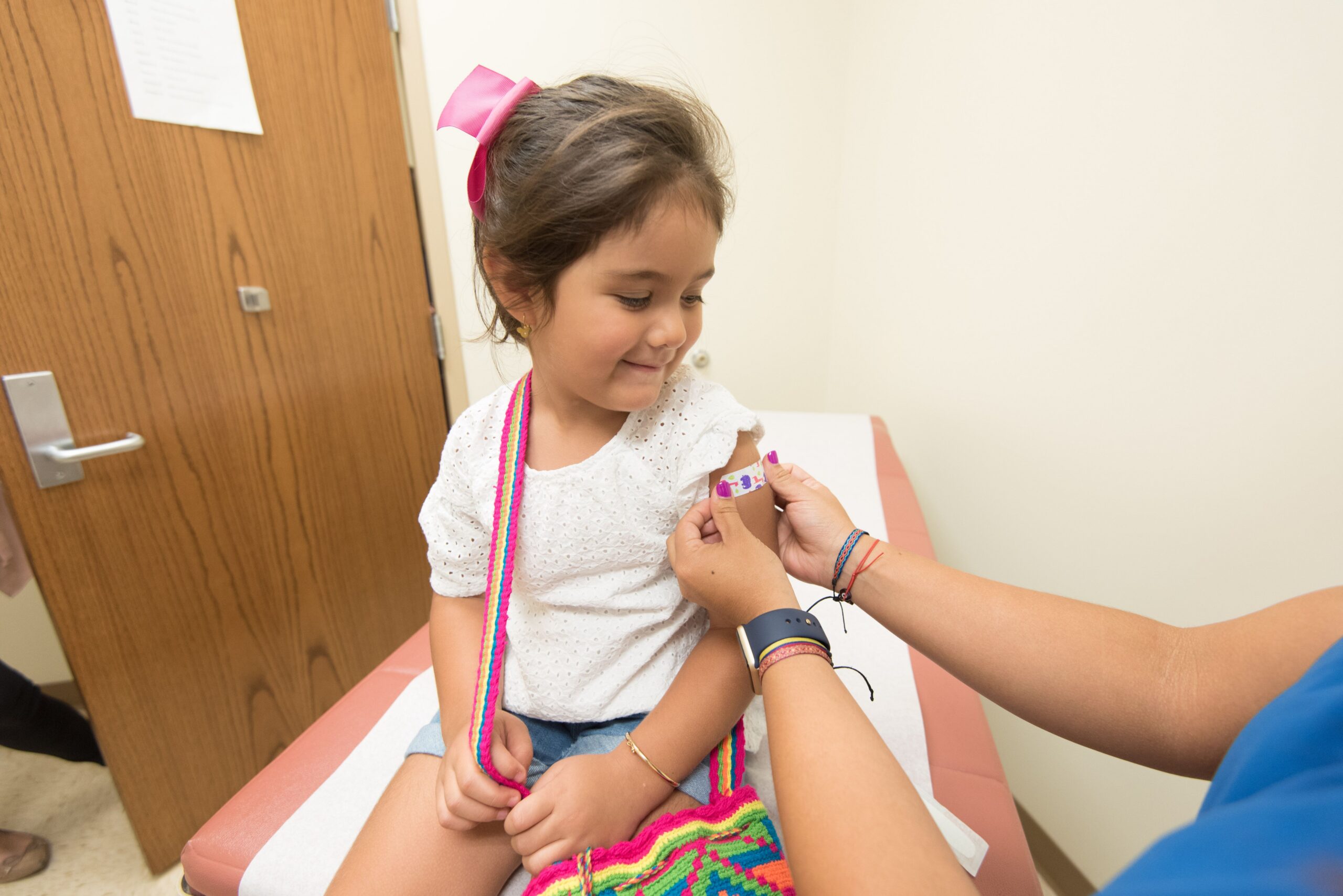 Child getting bandaid
